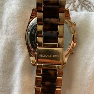 Michael kors watch, crack in face